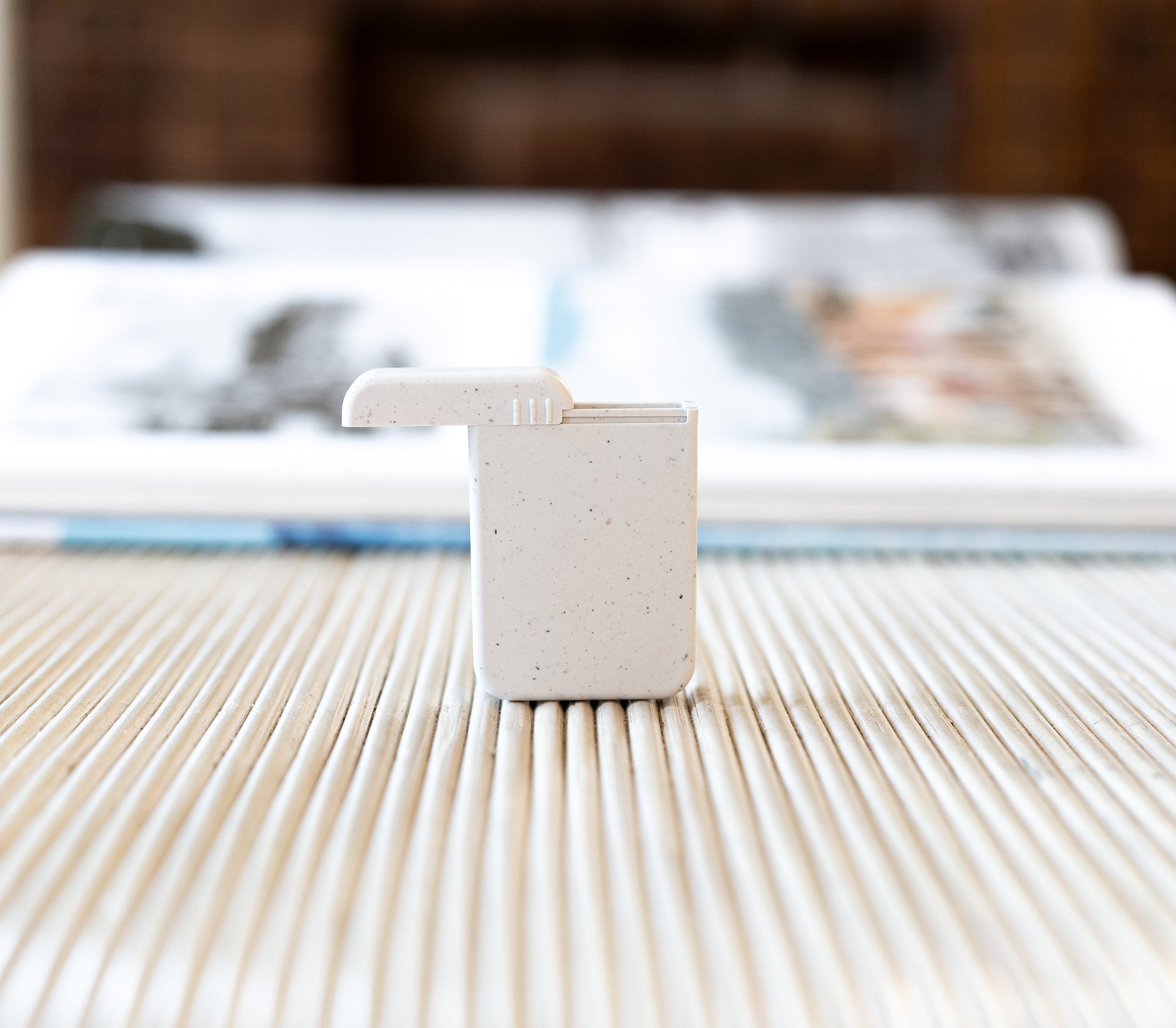 AndAround on-the-go travel pill case on a table