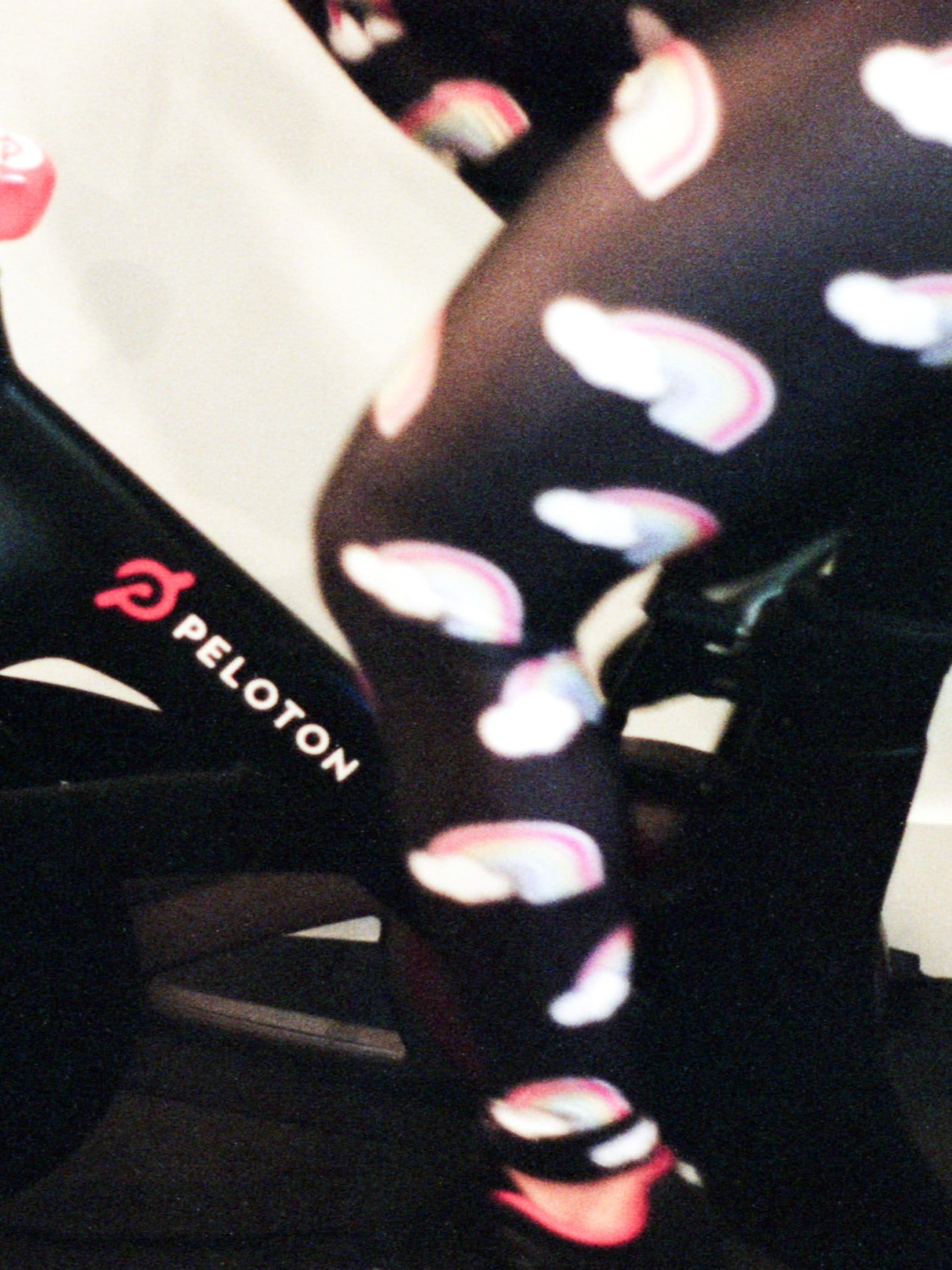 Celebrity makeup artist Jamie Greenberg's legs as she's riding her Peloton bike