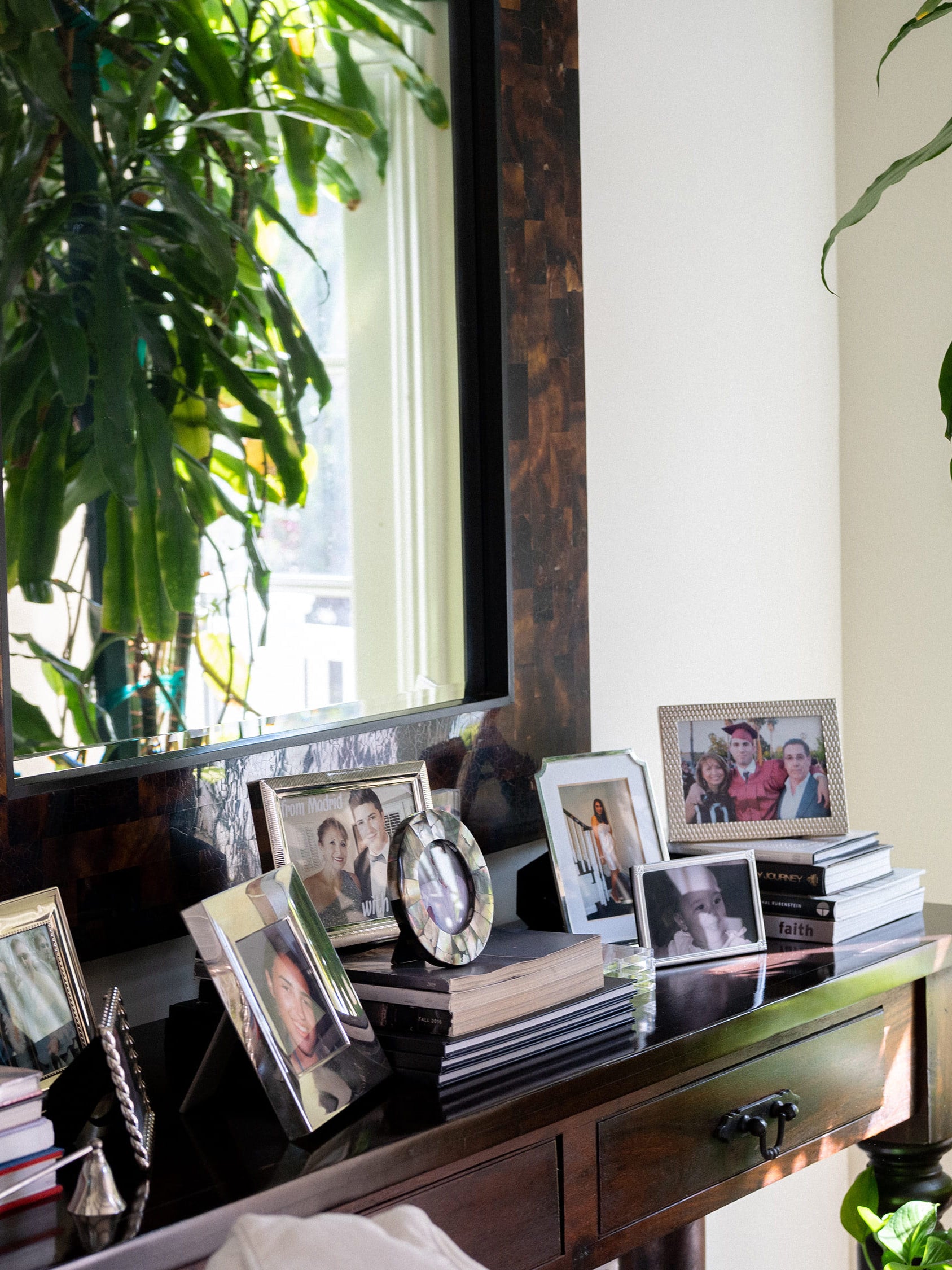 Margarita Arriagada's family photos on a vanity