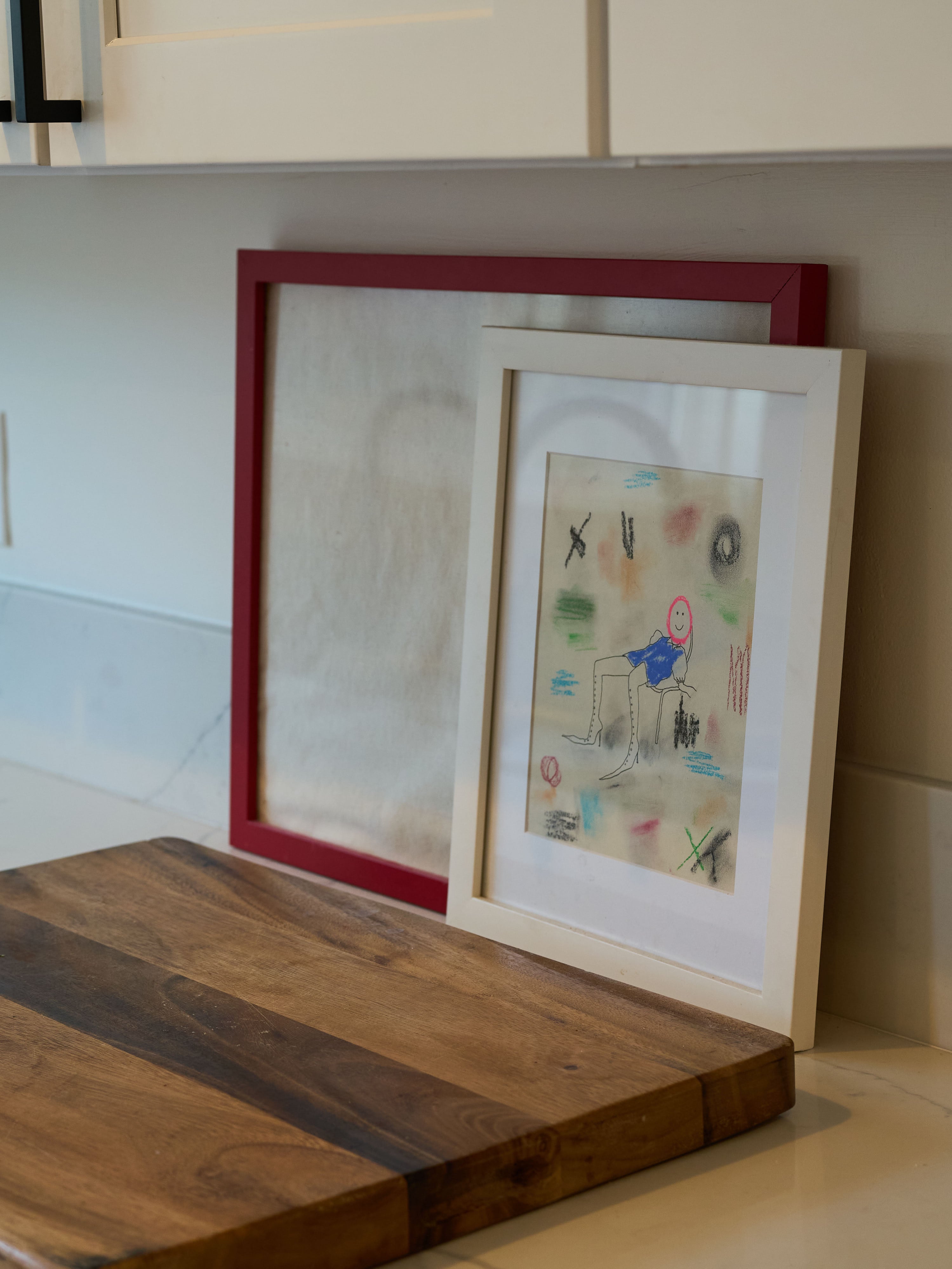 Chef Sandy Truong An Tran Ho's art and cutting board on her kitchen counter