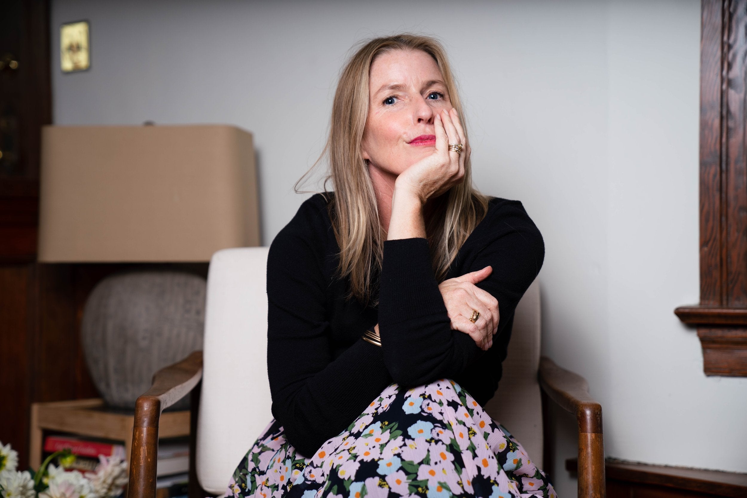 A portrait of Annie Armstrong Miyao sitting in a chair.