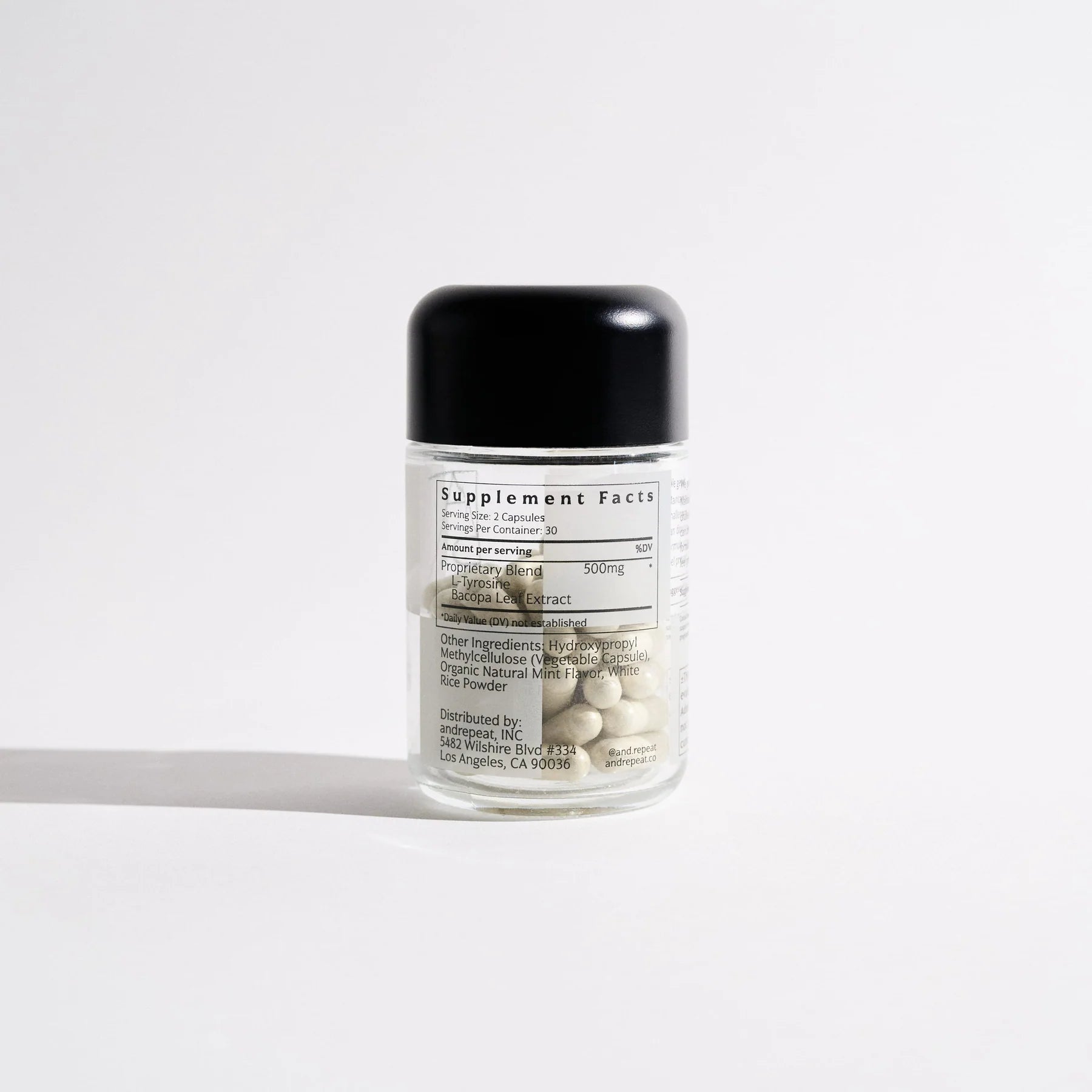 The back view of the AndRepeat AndFocus Supplement bottle supports mental health and focus during stress.