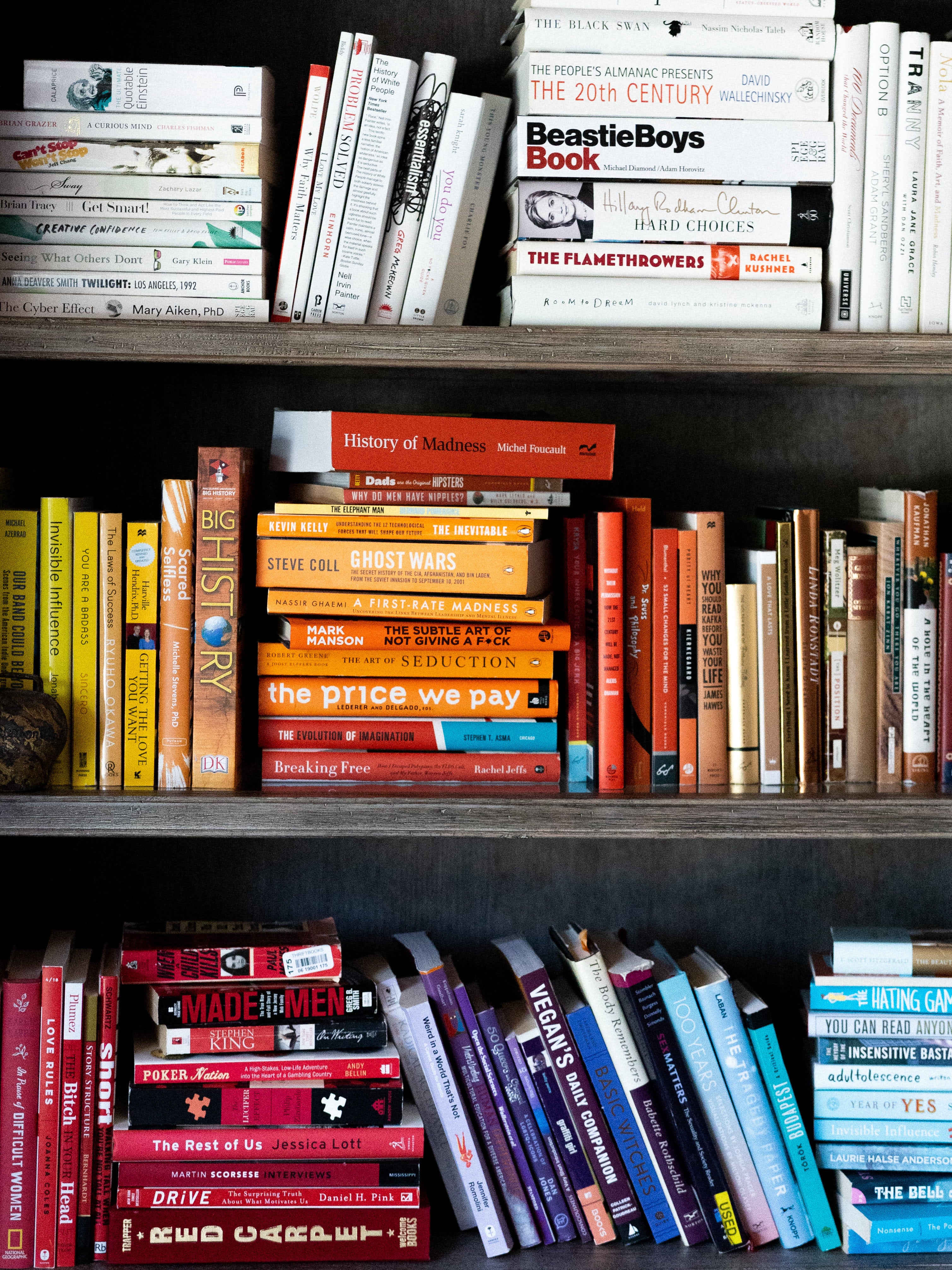 Mandy Teefey's bookshelf, organized by color of book
